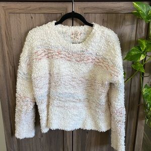 Super fluffy and warm sweater. Never worn.